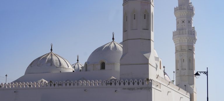 Photo by djonk creative a white building with towers