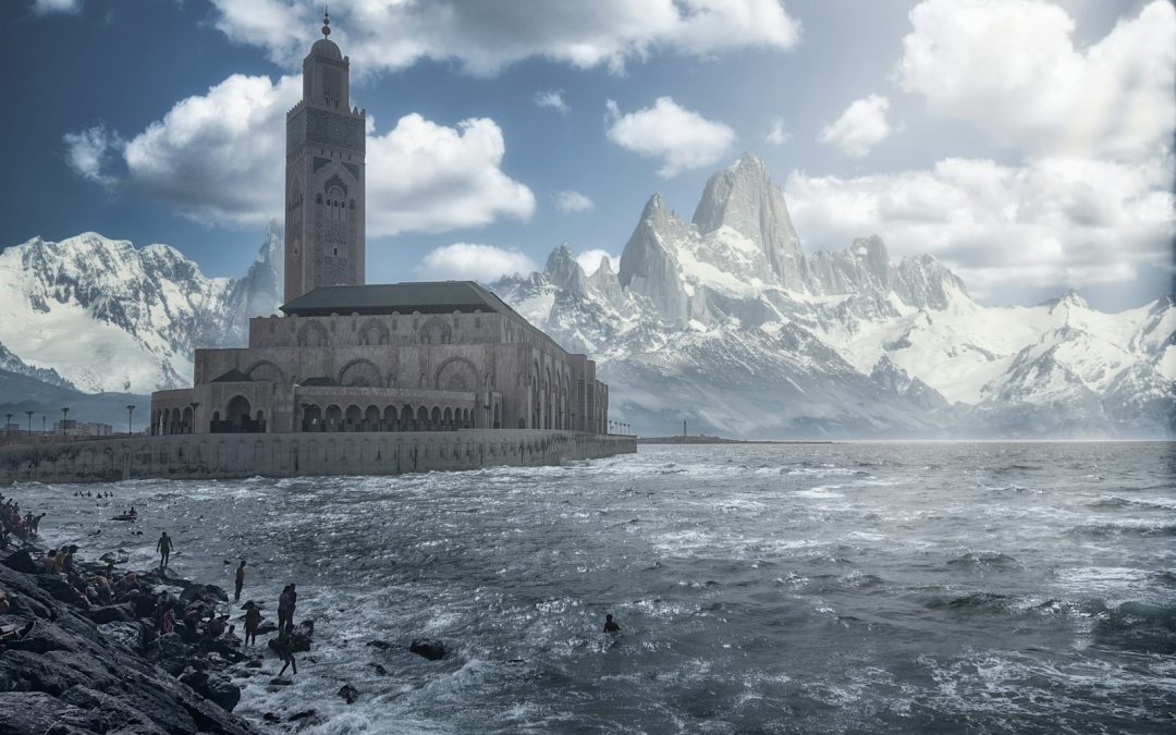 brown concrete building near body of water during daytime